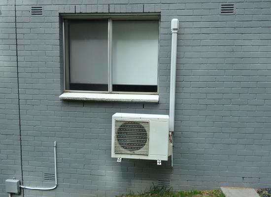Example,Of,Ductless,,Mini-split,Air,Conditioner,Installed,Outside,A,Home